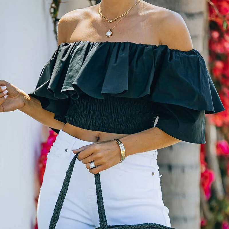 nihaostyle clothing wholesale new one-neck ruffled high-waist blouse NSOUY67472