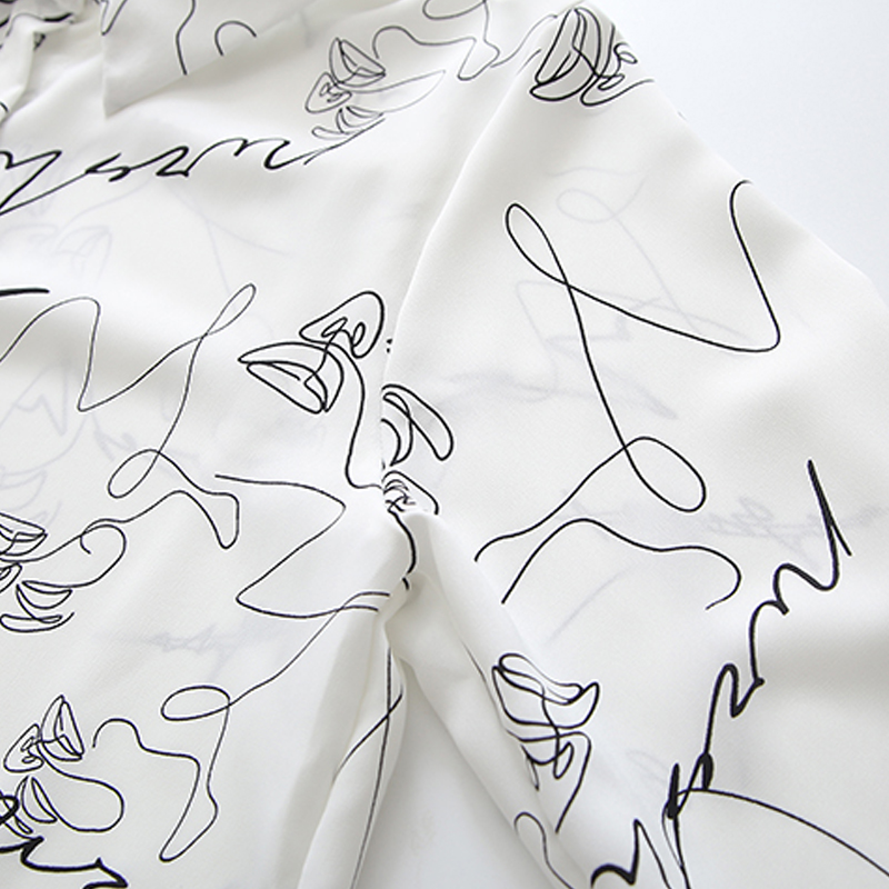 women s loose graffiti print lapel blouse nihaostyles clothing wholesale NSYID77482
