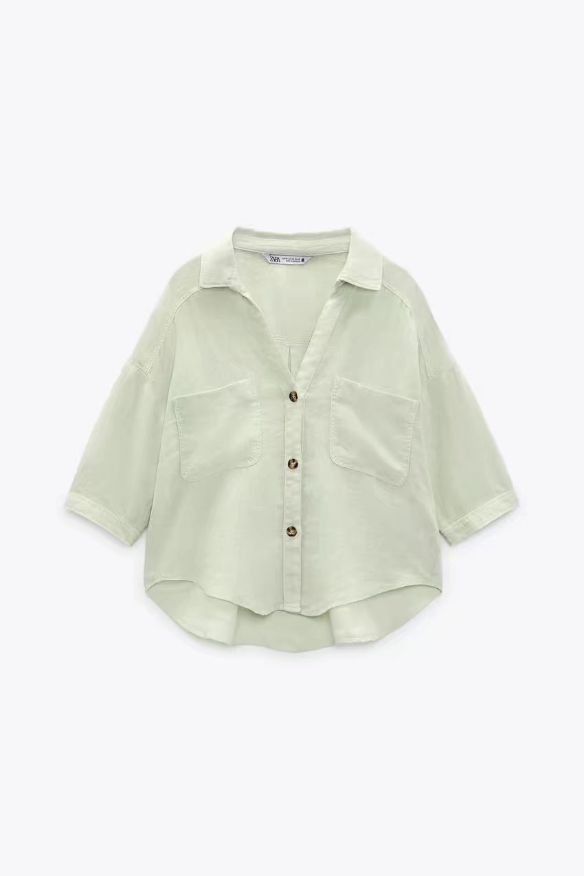 Camisa de lino de color liso de manga corta con solapa y botonadura sencilla NSLAY123193