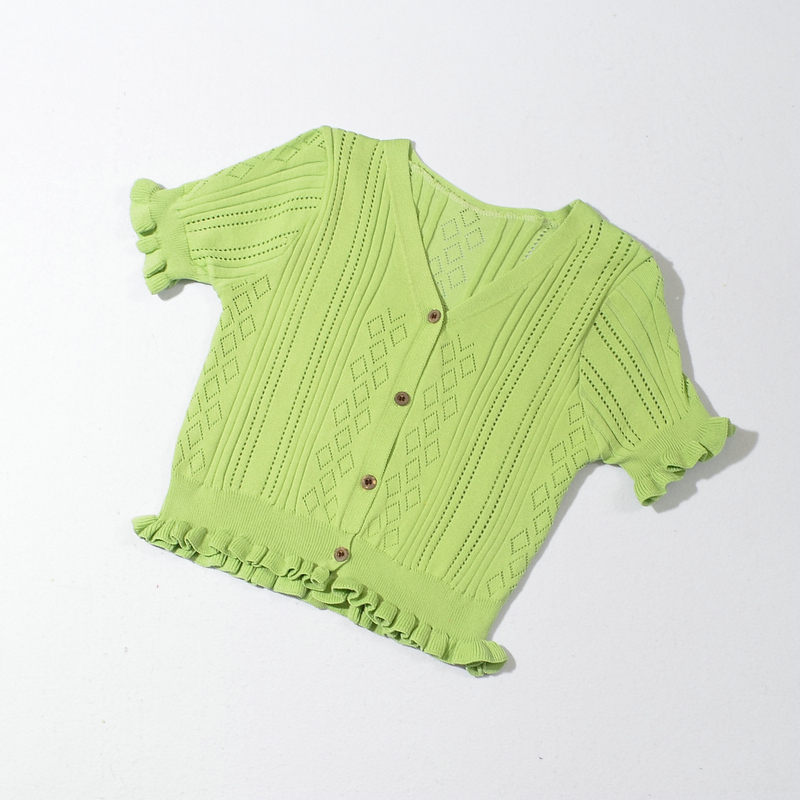 suéter corto con cuello en V y botones con borde de hongo NSYAY117621