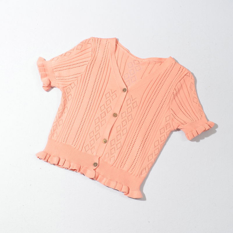 suéter corto con cuello en V y botones con borde de hongo NSYAY117621